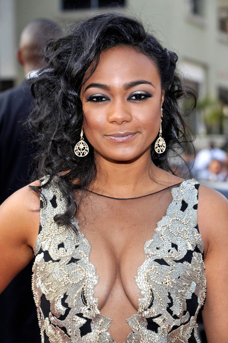 an image of tatyana ali in a dress