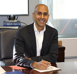 an image of tony balkissoon in suit